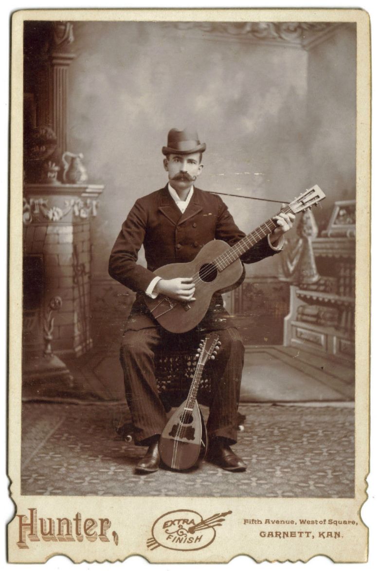 And He Sang to a Small Guitar